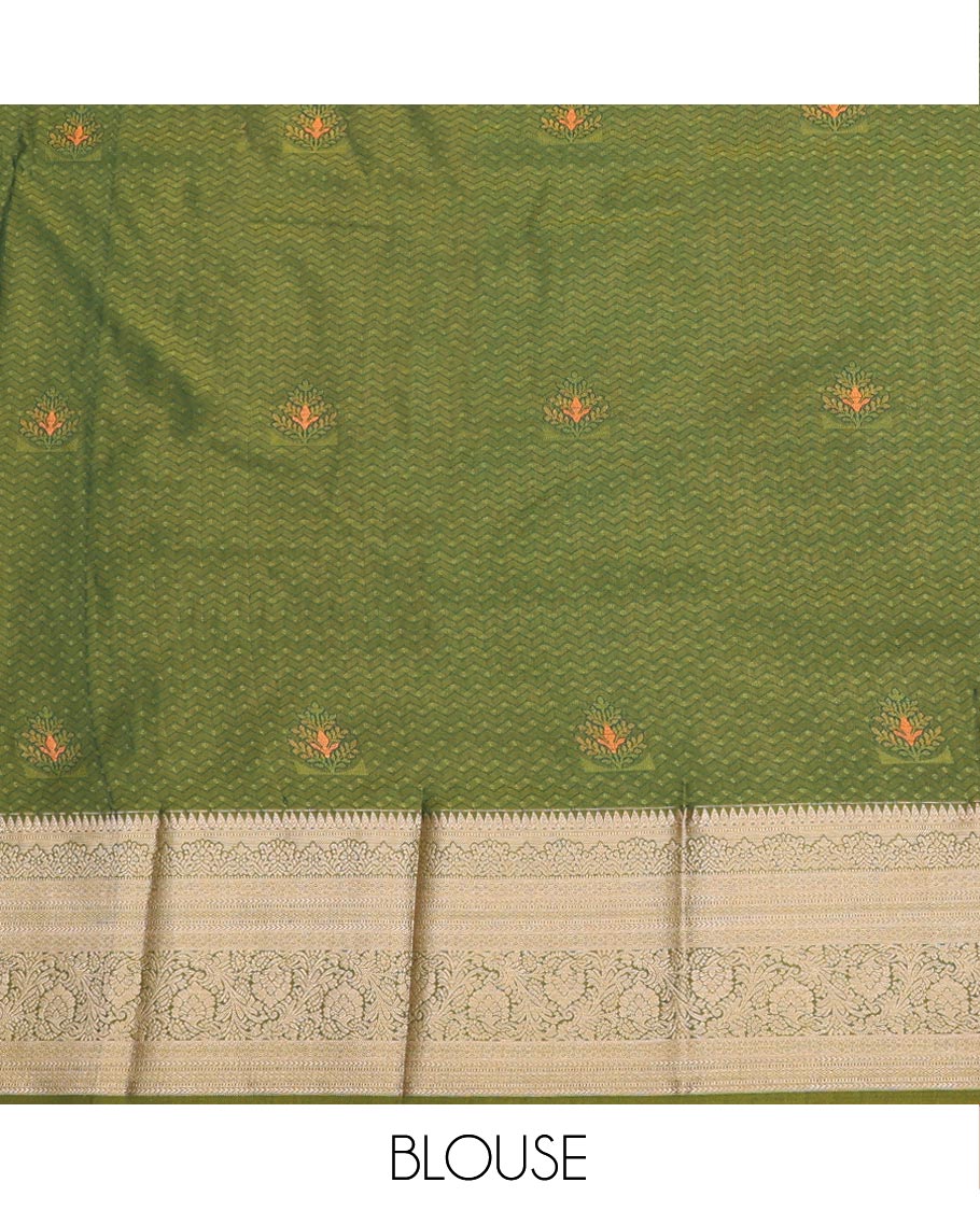 Green Art Silk Pavadai Material Set, Delicately Woven with Zari Buttas on Its Skirt, Complemented by a Contrast Traditional Zari Design Border, and Paired with a Contrast Blouse