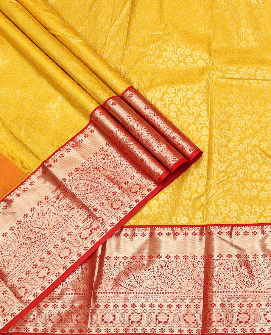 Yellow Art Silk Material Half Saree, Sparsely Sparkled with Jacquard Skirt, a Contrast Traditional Zari Border, Contrast Blouse, and an Intricate Dhavani