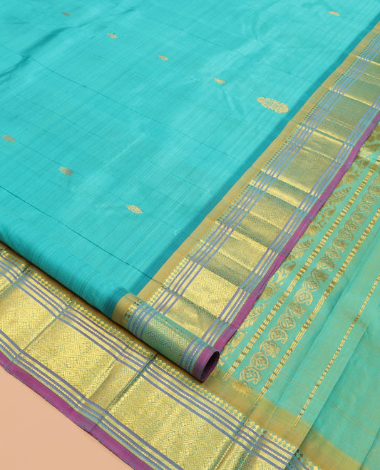 Blue Kanchipuram Silk Saree, Woven with Zari Buttas, a Contrast One-Sided Border of Panner Sombu, Banaras, Muthu, and Jaal Designs, Kodi Visiry Pallu, and a No Blouse