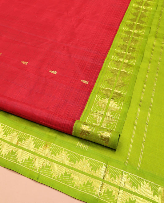 Red Kanchipuram Silk Saree, Detailed with Zari Buttas on Its Body, Complemented by a Contrast One-Sided Korvai Border of Thazampoo Rekku Designs, Pallu Depicts Zari Designs, and Comes Without a Blouse