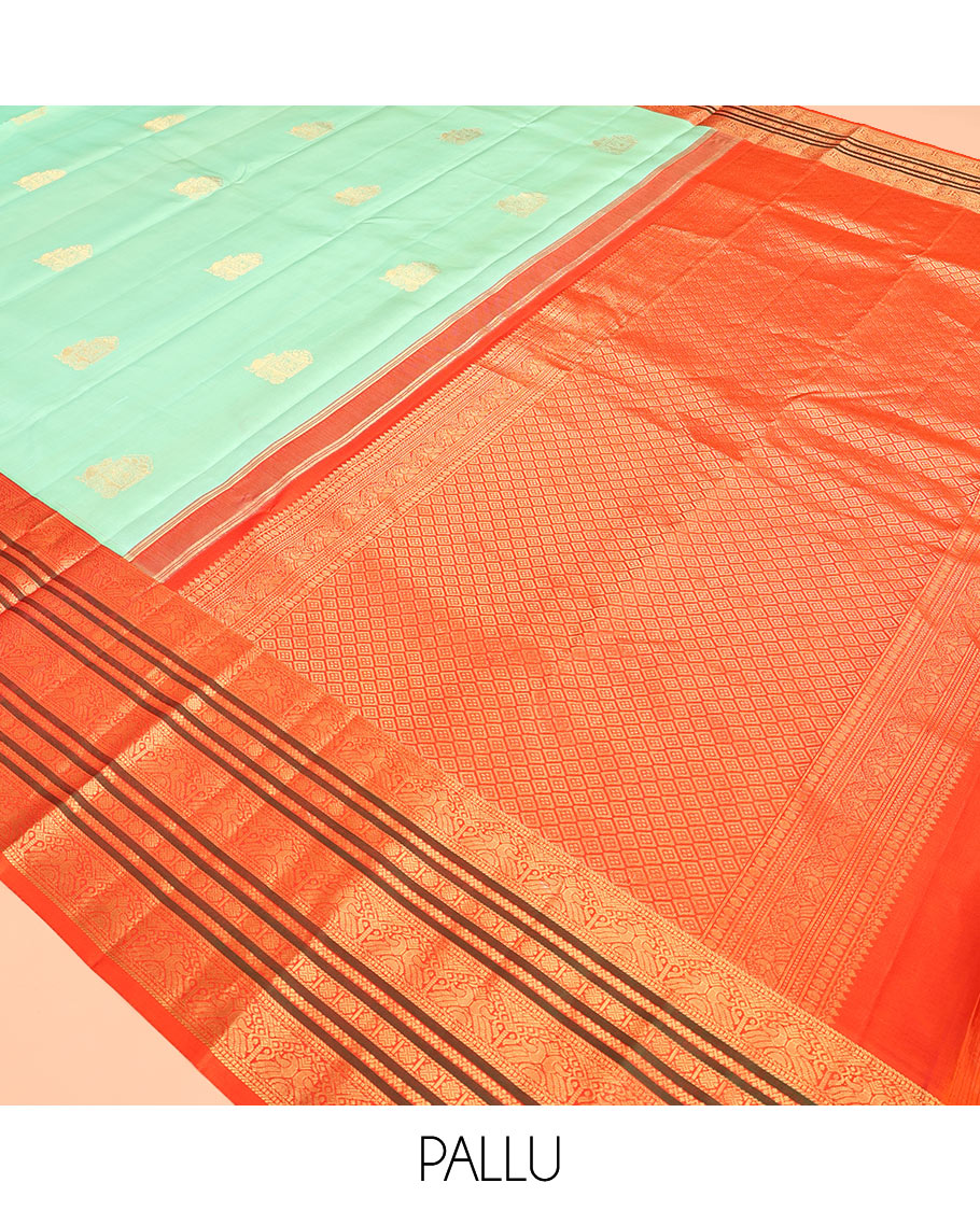 Turquoise Vasundhara Silk Saree, Finely Crafted with Zari Buttas, Complemented by a Contrast Border of Mayil, Neli, and Rudraksham Designs, Grand Pallu, and a Contrast Blouse