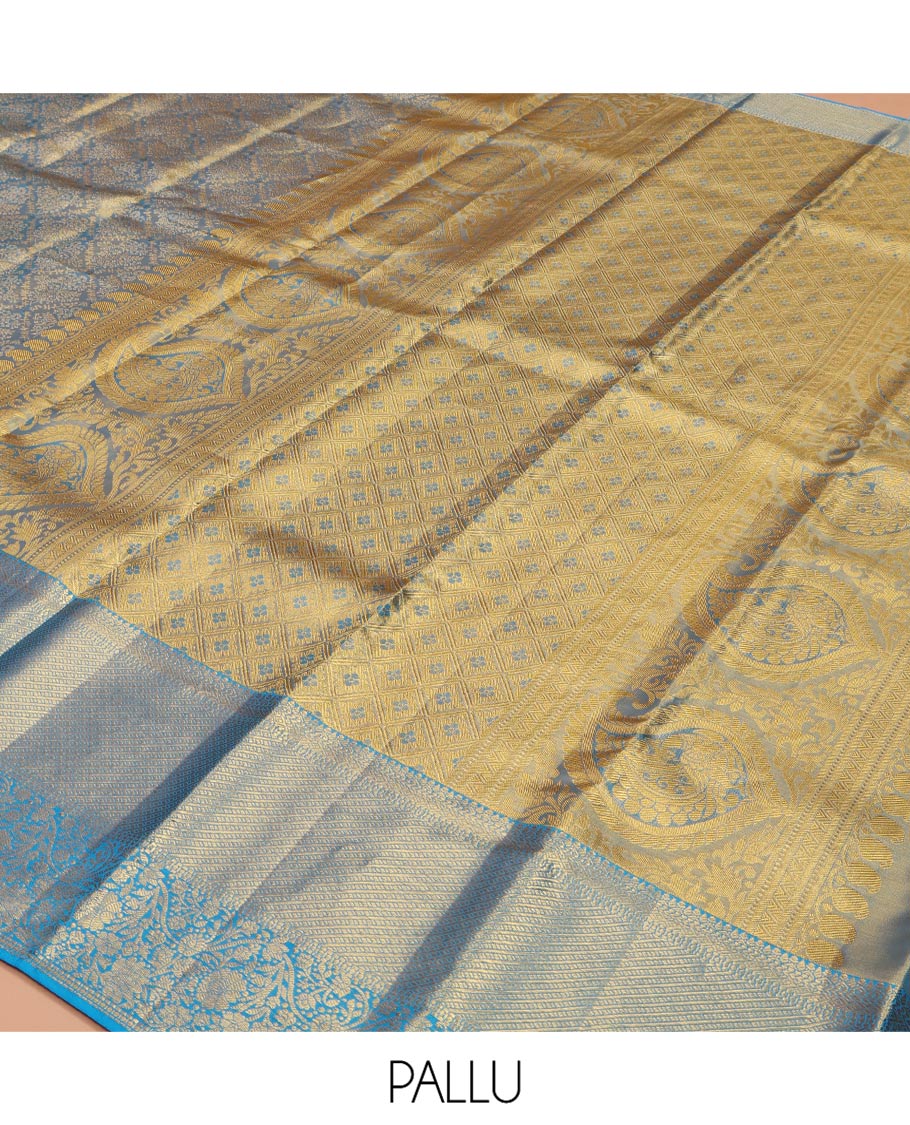 Blue Kanchipuram Silk Saree, Mesmerized with Zari Jacquard Design All Over Its Body, Highlighted by a Zari Border of Thilakam, Muthu, Kathir, Diamond, and Floral Designs, and Pallu of Jaal Designs, and Paired with a Matching Blouse