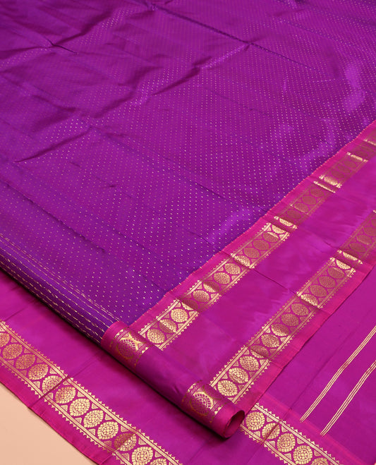Purple Kanchipuram Silk Saree, Steeped with Zari Buttas, Complemented by a Contrast One-Sided Border of Rekku, and Chakram Designs, Floral Design Pallu, and No Blouse