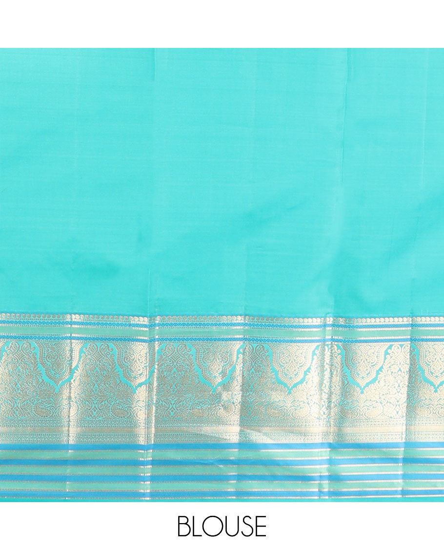 Light green floral buttas vasundhara elite silk saree with contrast intricate zari design border & floral zari design pallu