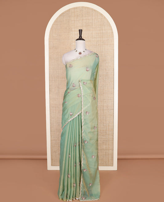 Pista green deer motifs embroidered designer saree, scallop sequins embroidered border