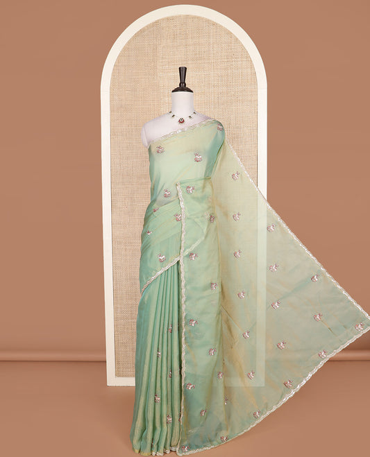 Pista green deer motifs embroidered designer saree, scallop sequins embroidered border