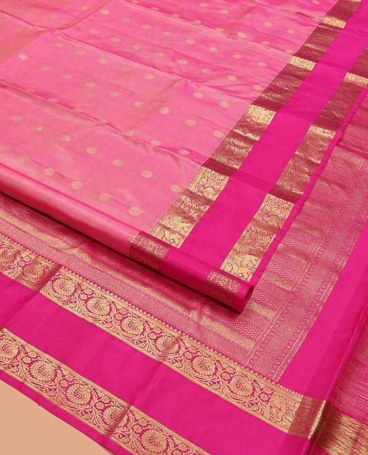 Pink Vasundhara Silk Saree, Subtly Enriched with Zari Buttas All Over Its Body, Complemented by a Contrast Rettai Pettu Border of Kodi Visiry Designs, Grand Geometric Design Pallu, and Paired with a Contrast Blouse