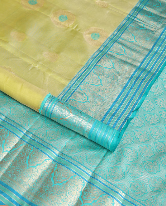 Light green floral buttas vasundhara elite silk saree with contrast intricate zari design border & floral zari design pallu