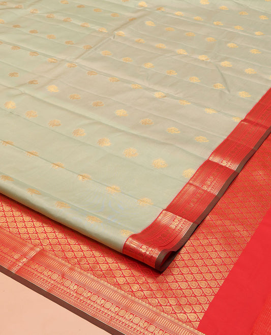 Pale Green Vasundhara Lite Silk Mix Saree, Subtly Sparkled with Zari Buttas on Its Body, Complemented by a Contrast Border of Annam and Chakram Designs, Grand Pallu of Spade Designs, and Paired with a Contrast Blouse