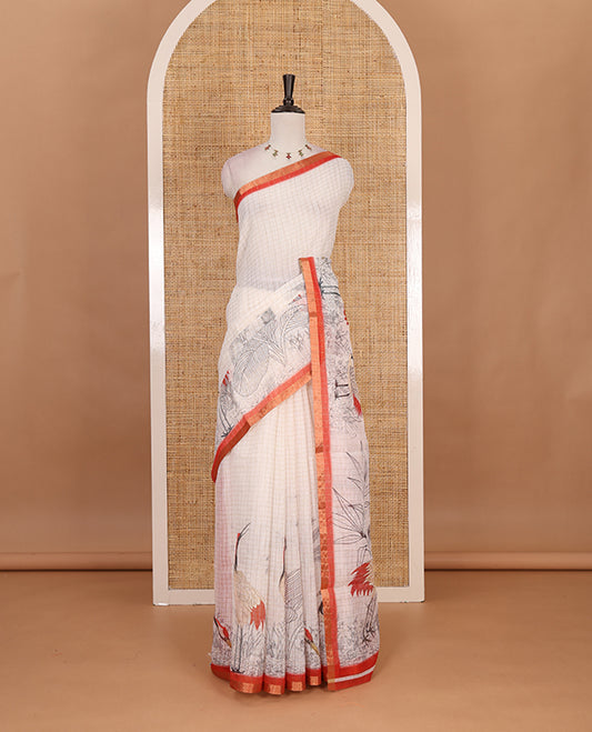 White with orange zari checks linen saree with contrast border and unique designs of pallu along with contrast plain blouse