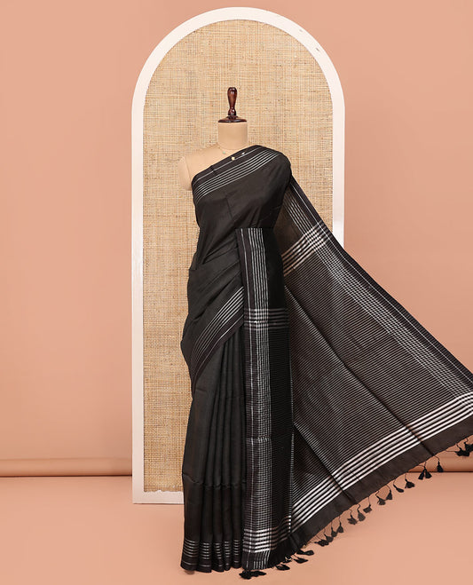 Black Plain Banana Pith Saree, Subtle Striped Border, Pallu Steeped with Stripes, and Paired with a Matching Blouse