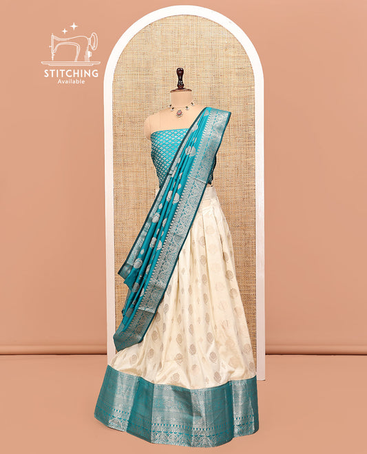 Cream-Blue Art Silk Half Saree, Embellished with Zari Buttas Skirt, Contrast Traditional Border, Jacquard Blouse, and a Contrast Banaras Dhavani