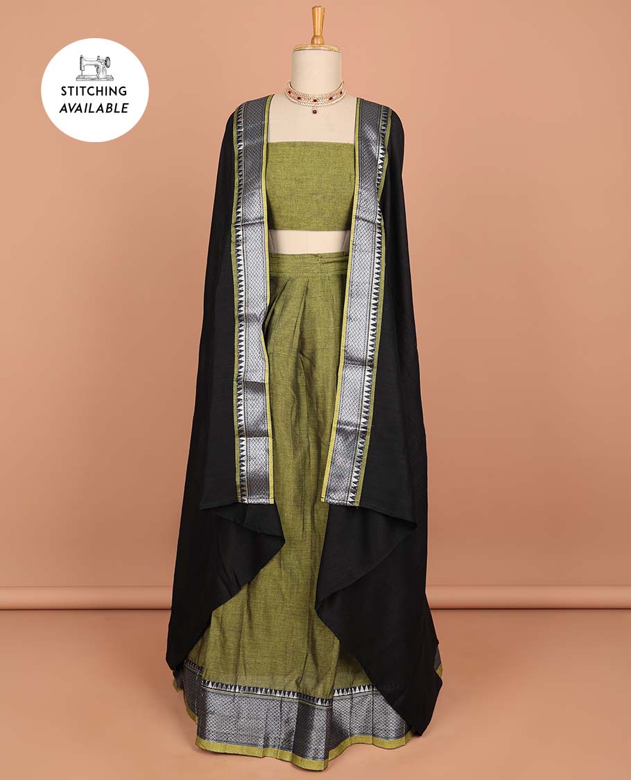 Green cotton half saree with contrast traditional border, plain blouse & plain dhavani with zari design border