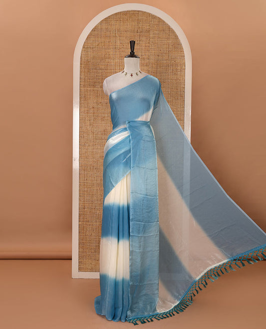 Borderless blue tie-dye-style printed fendy satin saree, self-pallu with tassels & plain blouse
