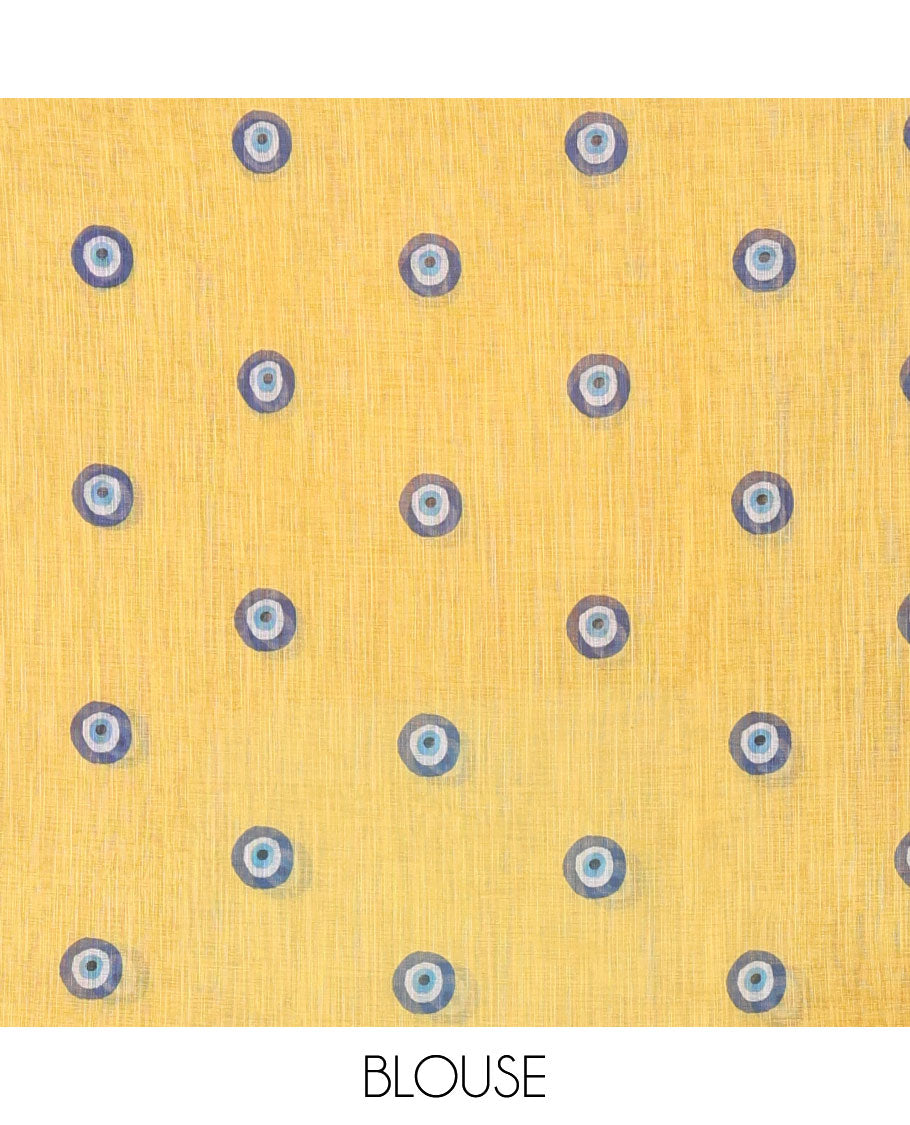 Yellow evil eye motifs printed linen cotton saree, diamond motifs printed with piping border, chevron printed pallu, and a matching blouse