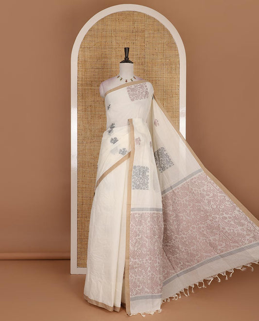 Cream bird motifs printed Handloom cotton saree, contrast piping border, pallu of bird motifs print, and a matching blouse