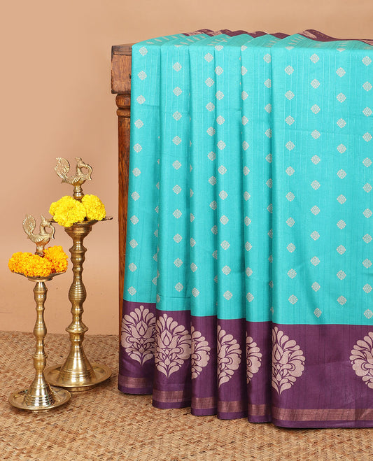 Rama green with purple butta printed kathan silk saree with contrast floral zari border & rich printed pallu along with printed blouse