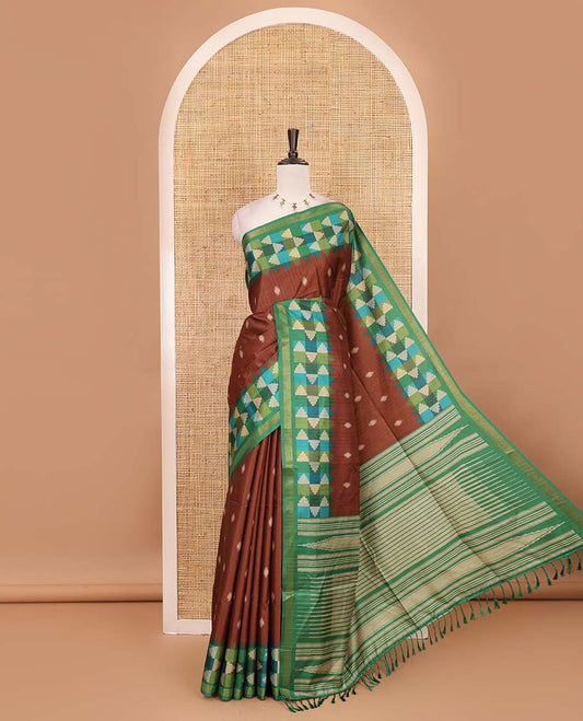 Brown striped and buttas kathan silk saree, contrast multi-color temple border, seer printed pallu, and contrast printed blouse