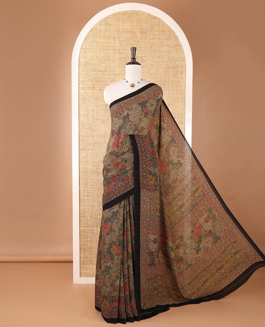Black intricate paisley printed kimaya saree, floral printed border, paisley printed pallu & contrast printed blouse