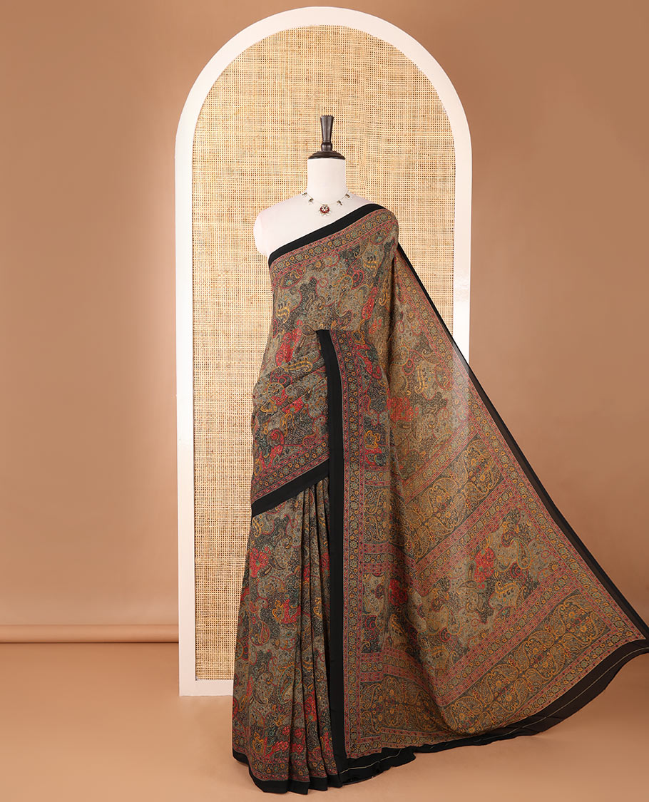Black intricate paisley printed kimaya saree, floral printed border, paisley printed pallu & contrast printed blouse