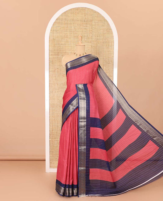 Pink vertically striped moss chiffon saree with contrast traditional zari design borders, striped pallu, and a contrast blouse