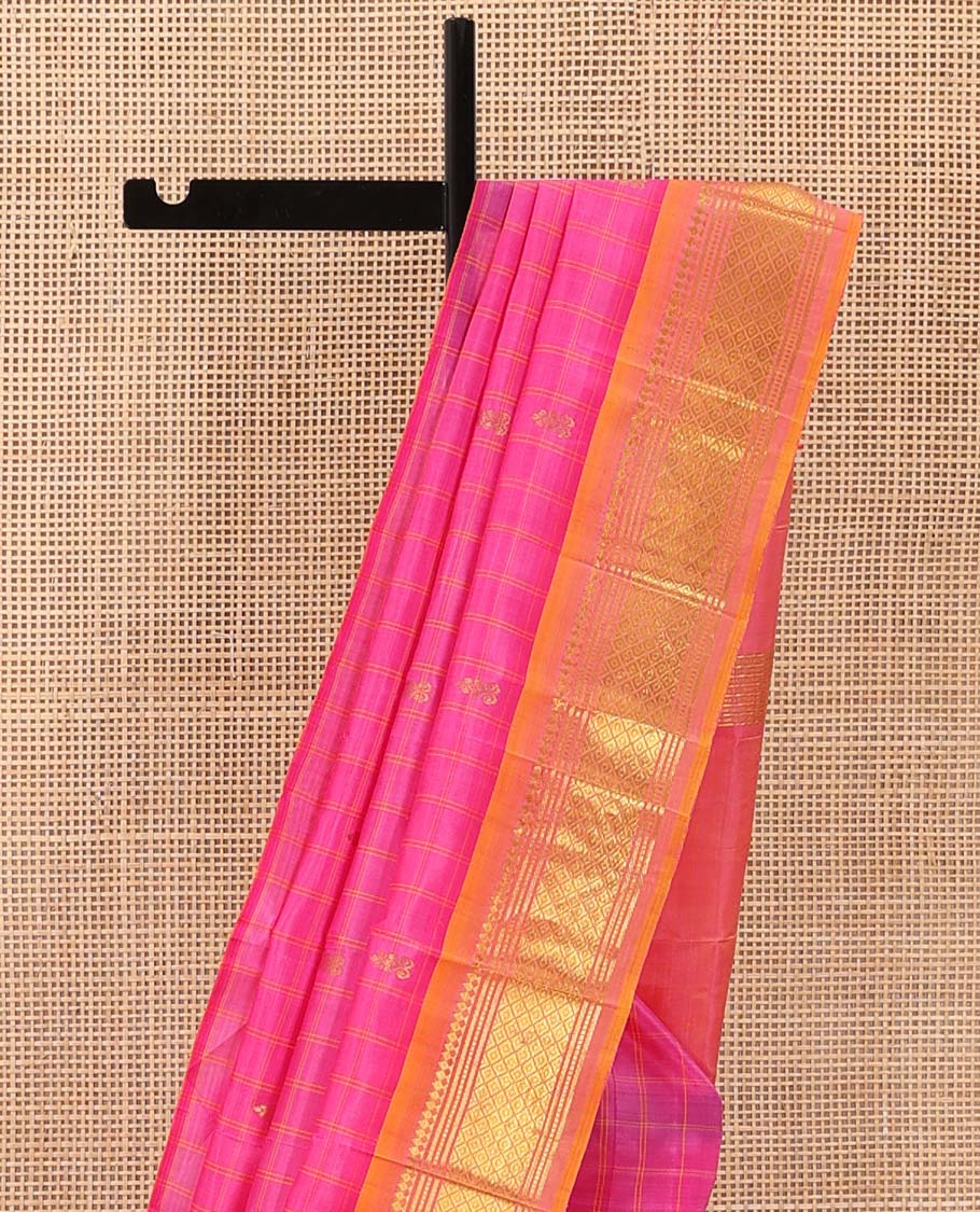 Pink checked and zari buttas Kanchipuram silk saree, contrast one-sided border of paneer sombu, banaras, muthu, and jaal design, and zari design pallu