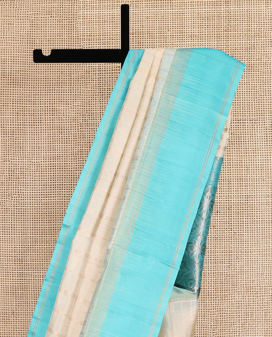 Cream Mayuri Soft Silk Saree, Mesmerized with Zari Stripes, Complemented by a Contrast Zari Striped Border, Zari Design Pallu, and a Contrast Blouse