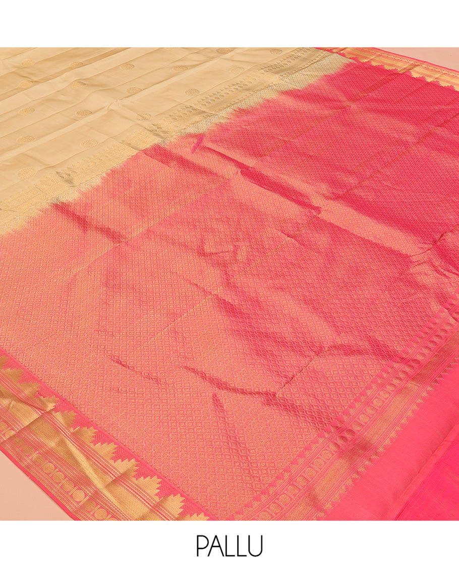 Sandal Vasundhara Lite Silk Mix Saree, Sparsely Sparkled with Chakram Buttas, a Contrast Border of Thazampoo Rekku, Neli, Mayil Kann, and Rudhraksham, Grand Pallu, and a Contrast Blouse