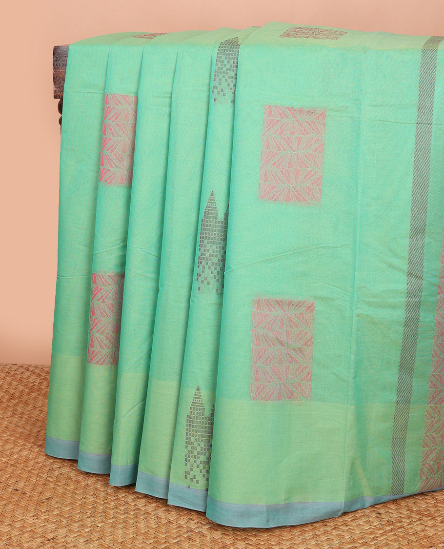 Green buttas Combatiore cotton saree, contrast plain border & geometric patterned pallu