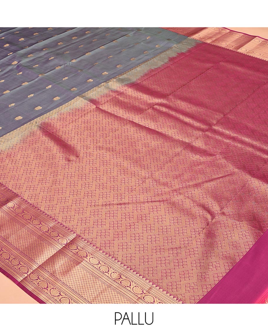 Grey Vasundhara Lite Silk Mix Saree, Beautifully Bedecked with Zari Buttas All Over Its Body, Complemented by Contrast Border of Rekku, Muthu, Kodi Visiry, and Jaal Designs, Grand Pallu and Paired with a Contrast Blouse
