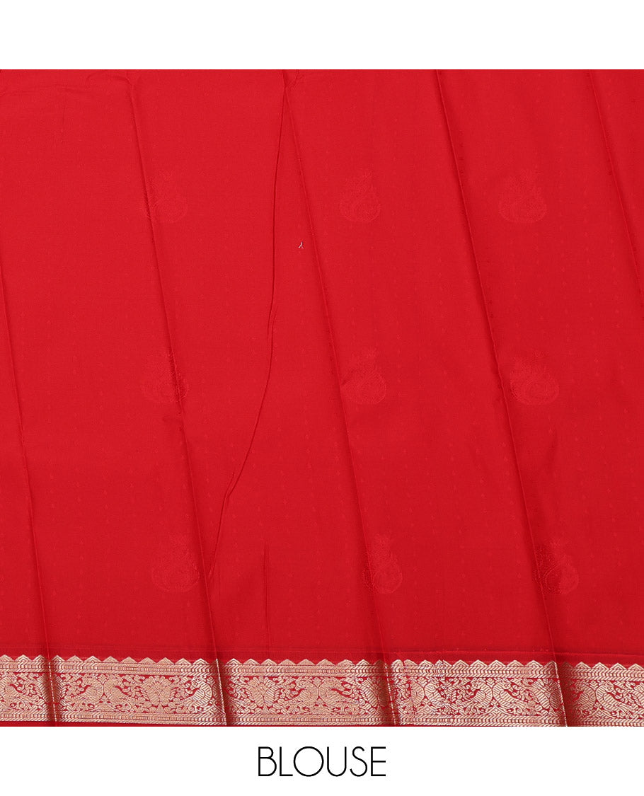 Orange Budget Silk Saree, Woven with Zari Buttas All Over Its Body, Complemented by a Contrast Peacock Zari Design Border, Geometric Patterned Pallu, and Paired with a Contrast Blouse