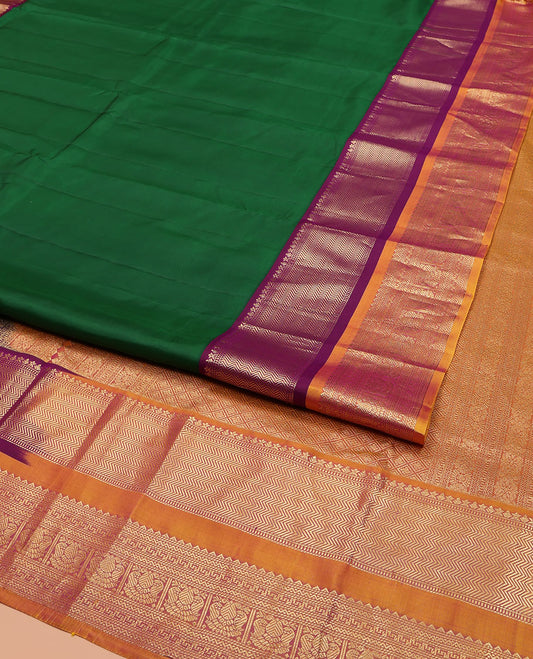 Green Plain Vasundhara Lite Silk Mix Saree, Complemented by a Contrast Border of Muthu, Vanki, Rekku, Banaras, Neli, and Iruthalai Pakshi Designs, Grand Jaal Pallu, and Paired with a Contrast Blouse