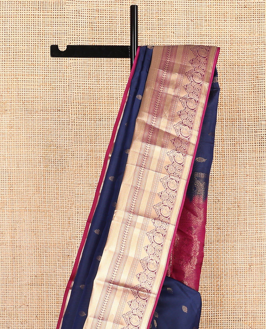 Navy blue zari buttas Vasundhara silk mix saree, contrast border of muthu, kuyil kann, kathir, manga, and mayil chakram designs, and floral design pallu