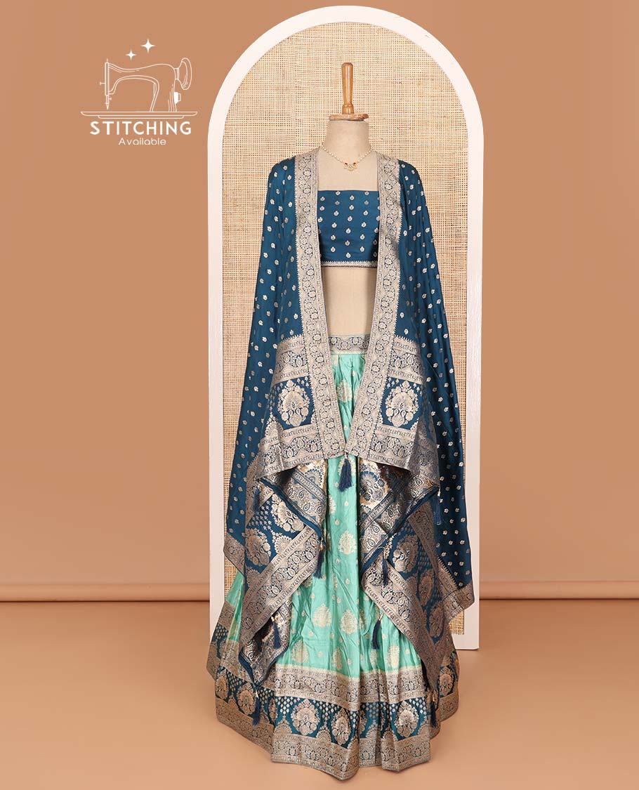 Green lehenga set, intricate motifs with contrast Mughal style bordered skirt, jacquard blouse, and banarasi zari design dhavani