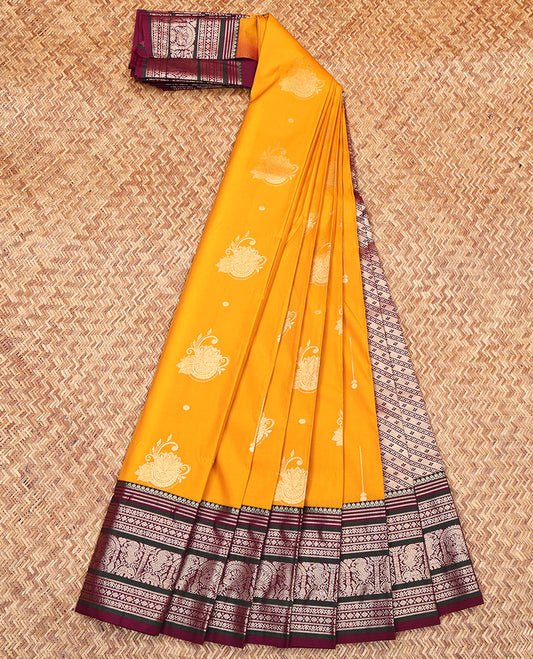 Yellow Budget Silk Saree, Sparsely Woven with Zari Buttas All Over Its Body, Complemented by a Contrast Traditional Zari Design Border, Pallu of Buttas and Stripes, and Paired with a Contrast Blouse