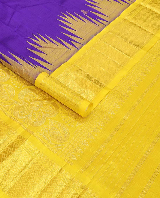 Blue buttas kancheepuram silk saree with contrast border of rekku, thilakam mokku, banaras design & zari design pallu