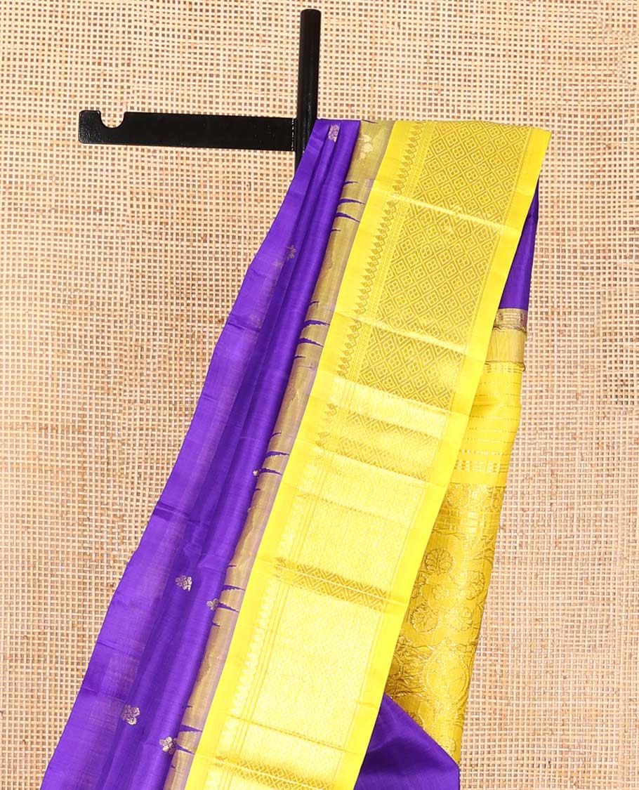 Blue buttas kancheepuram silk saree with contrast border of rekku, thilakam mokku, banaras design & zari design pallu