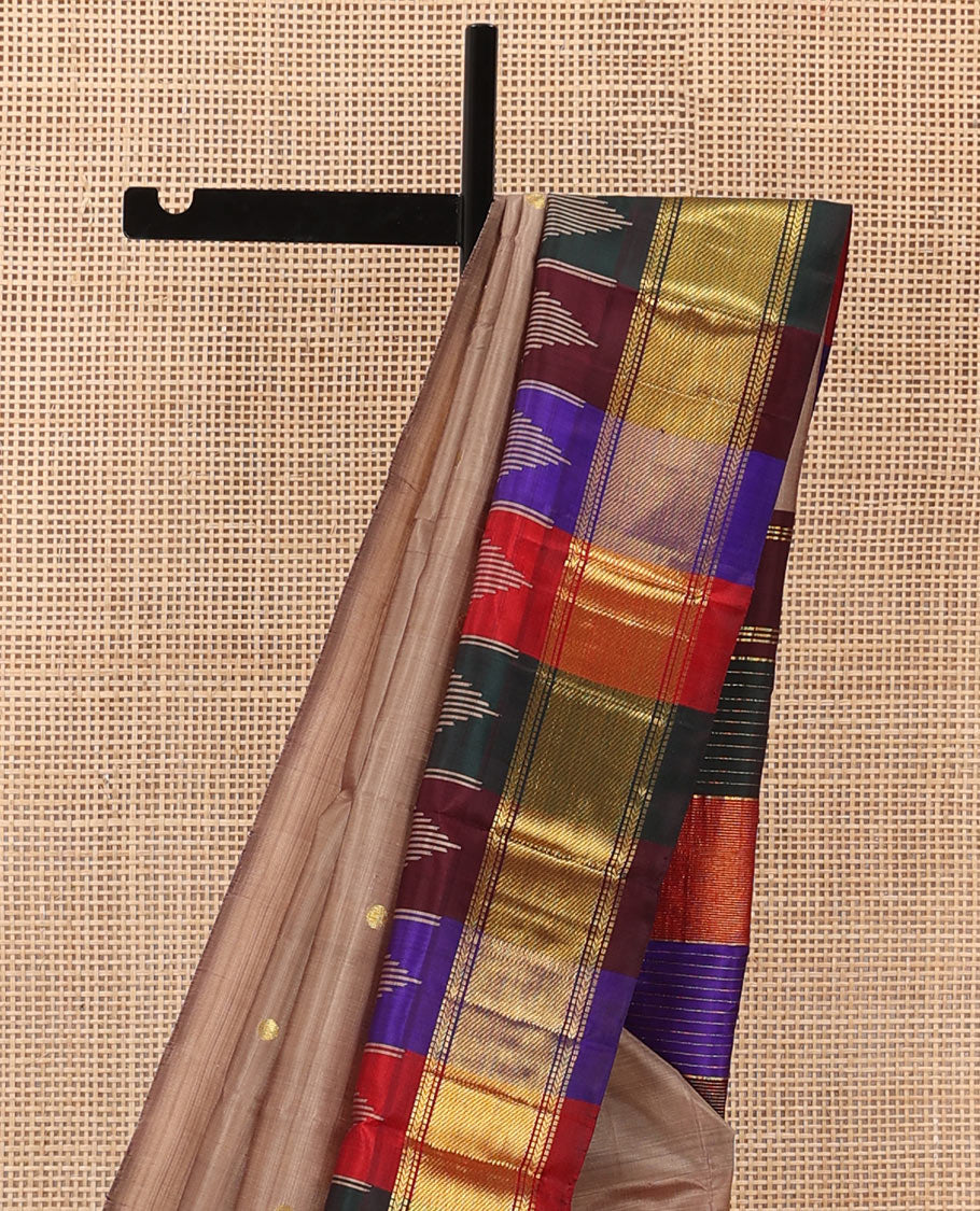 Brown zari buttas Kanchipuram silk saree, contrast multi-colored one-sided thazampoo rekku zari border, and multi-colored zari striped pallu