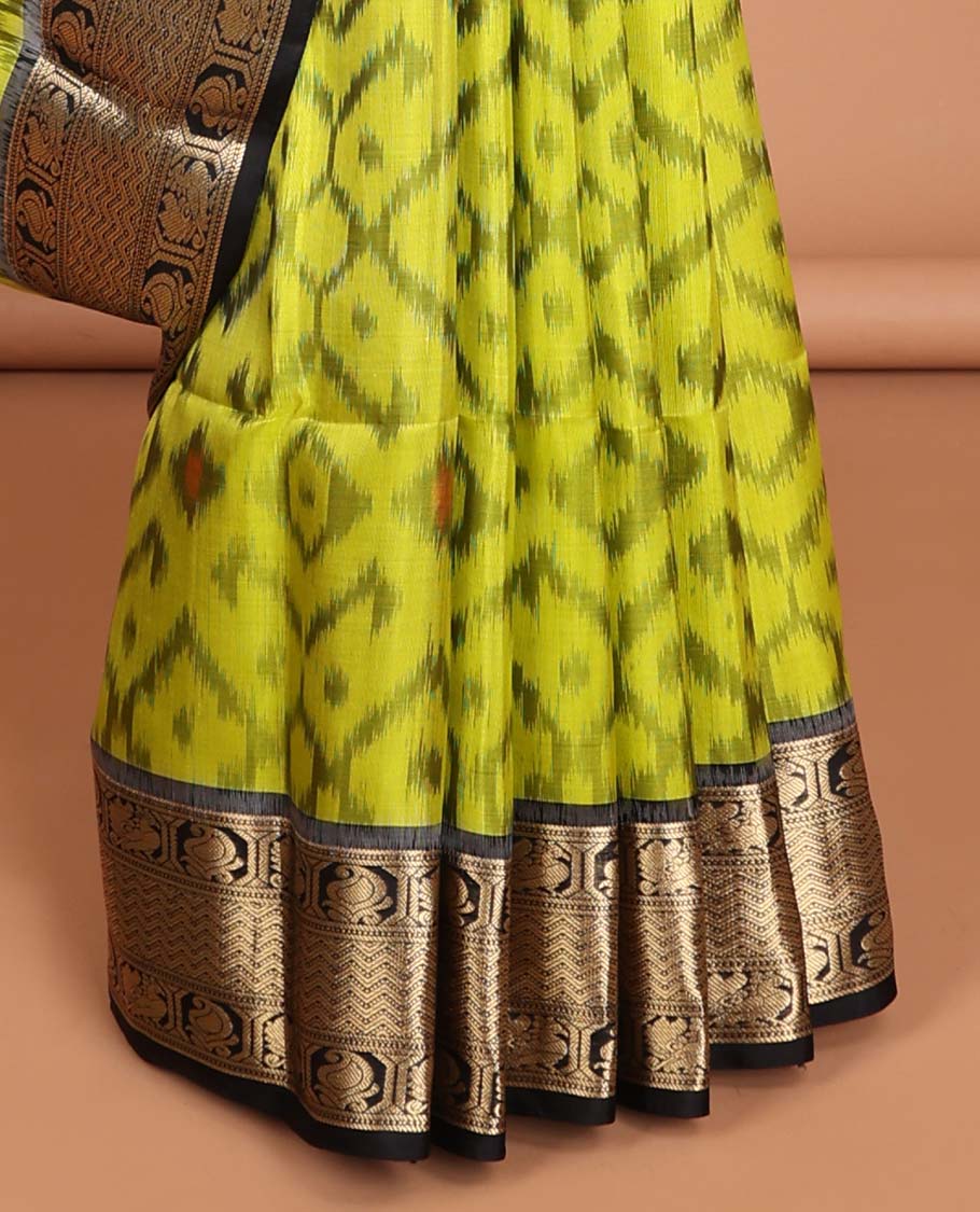 yellow ikkat style floral design soft silk saree with contrast zari border & traditional zari design pallu