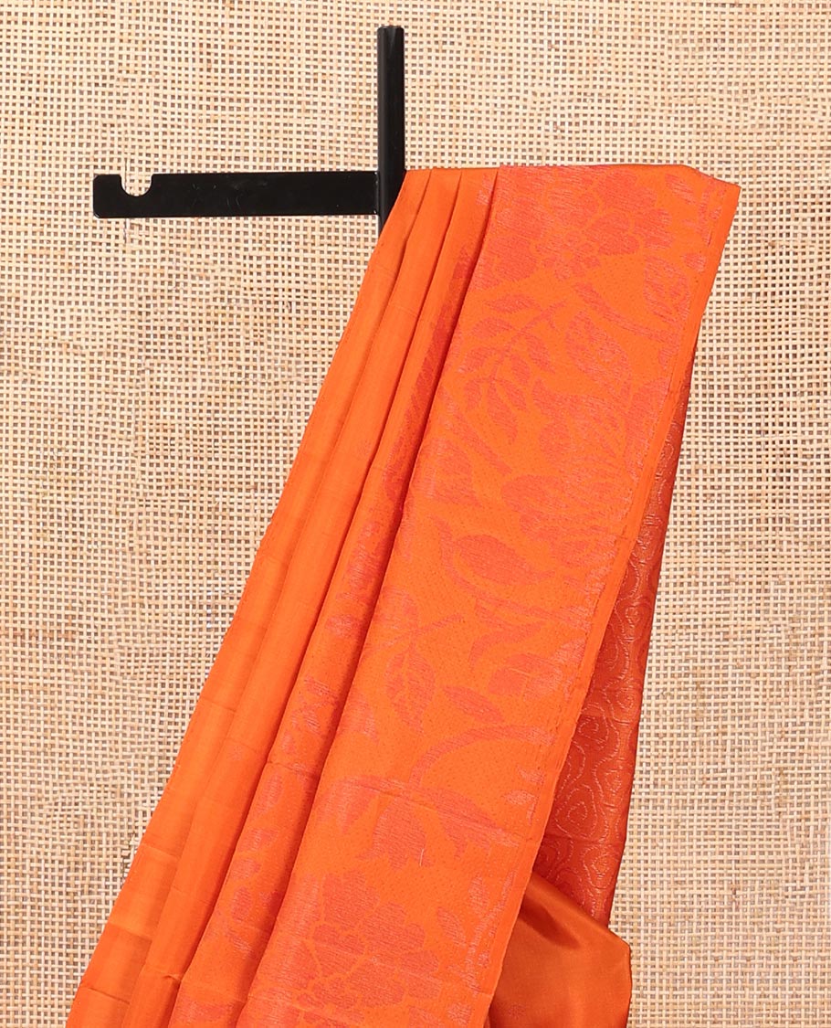 Borderless fanta orange sparsely woven floral design soft silk saree, geometric patterned pallu