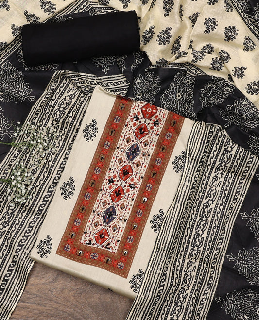Cream and black material chudidar set, block printed with neck work top, contrast plain bottom, and intricately block printed dupatta