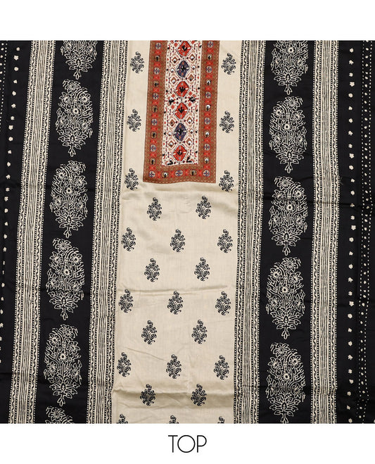 Cream and black material chudidar set, block printed with neck work top, contrast plain bottom, and intricately block printed dupatta