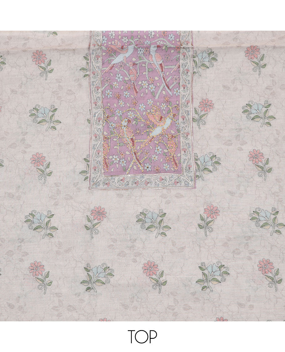 Cream material churidar set, floral-bird neck embroidered top, contrast plain bottom, and a Madhubani-floral printed dupatta