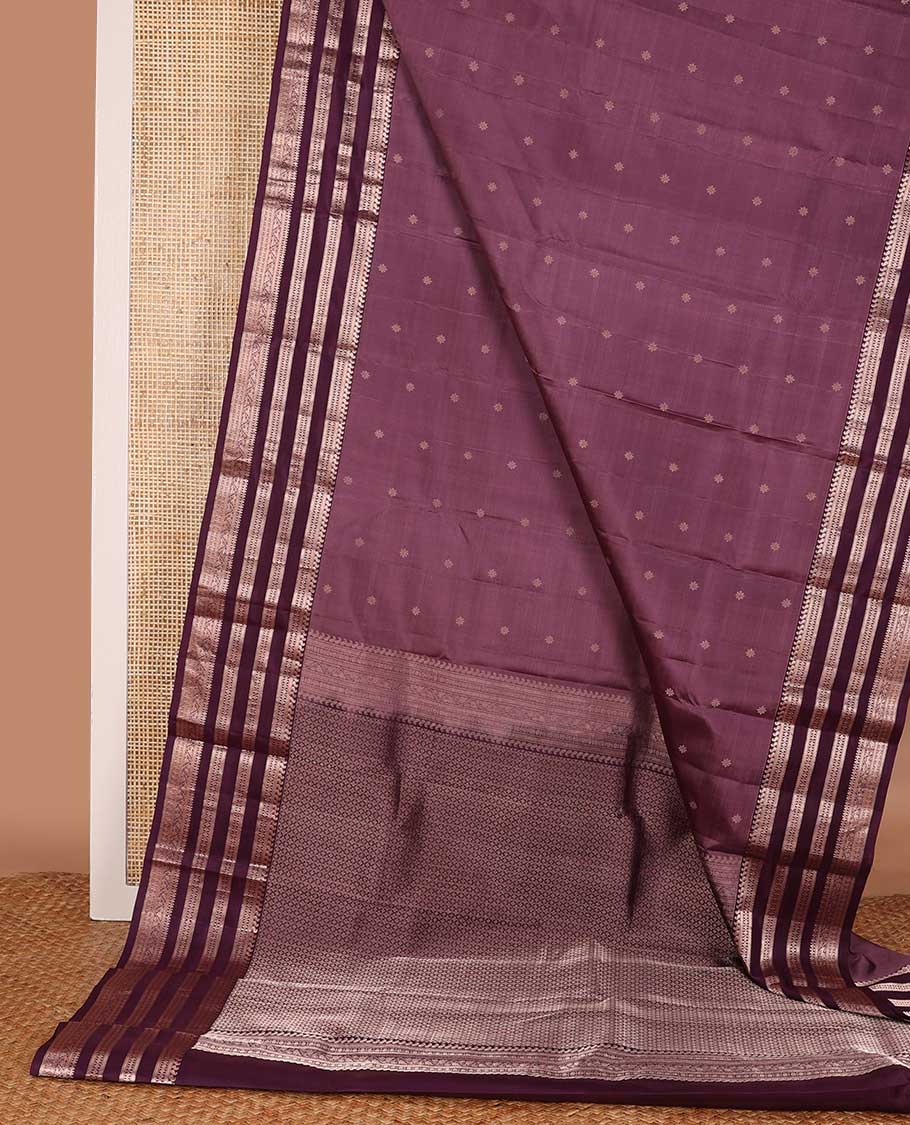 Brown silk saree with zari buttas, contrast border of manga, muthu, banaras, diamonds, and zari designs, and jaal pallu