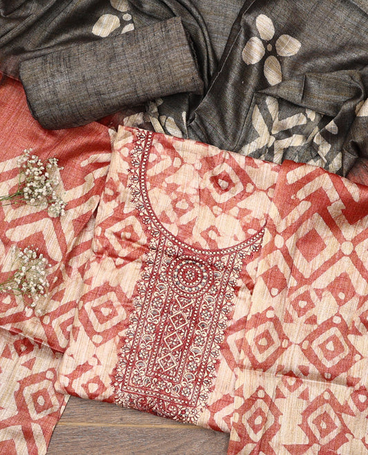 Light brown material chudidar set, batik style printed with neck embroidered top, contrast plain bottom, and batik printed dupatta
