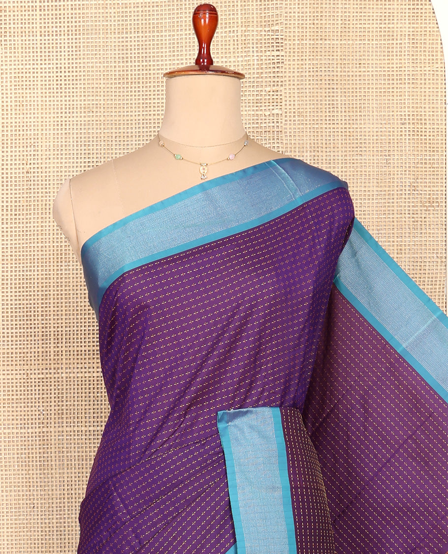Violet Aarani Silk Saree, Embellished with Plus-Shaped Zari Buttas All Over Its Body, Complemented by a Contrast Zari Border, Pallu of Stripes, and Paired with a Matching Blouse