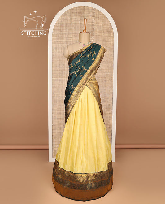 Lemon yellow banaras half saree with contrast zari design border ,  zari design blouse & floral zari design dhavani