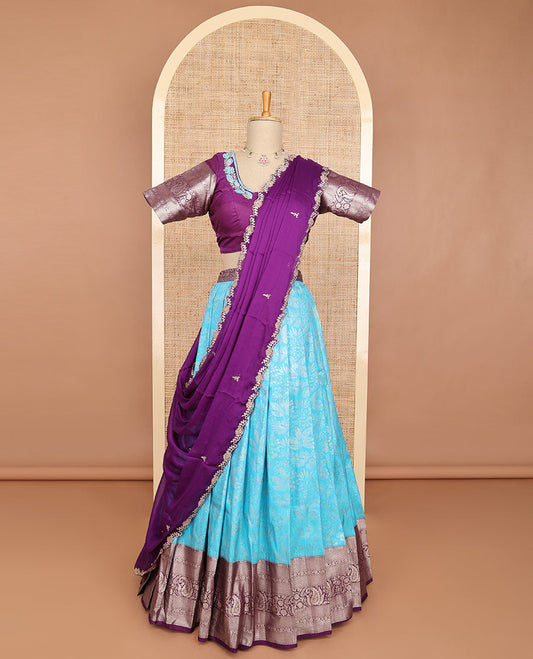 Baby blue floral art silk half saree with contrast zari design border, embroidered blouse & floral embroidery dhavani