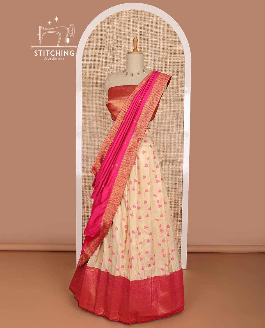 Cream floral buttas half saree with contrast zari design border, jaal design blouse & floral design dhavani