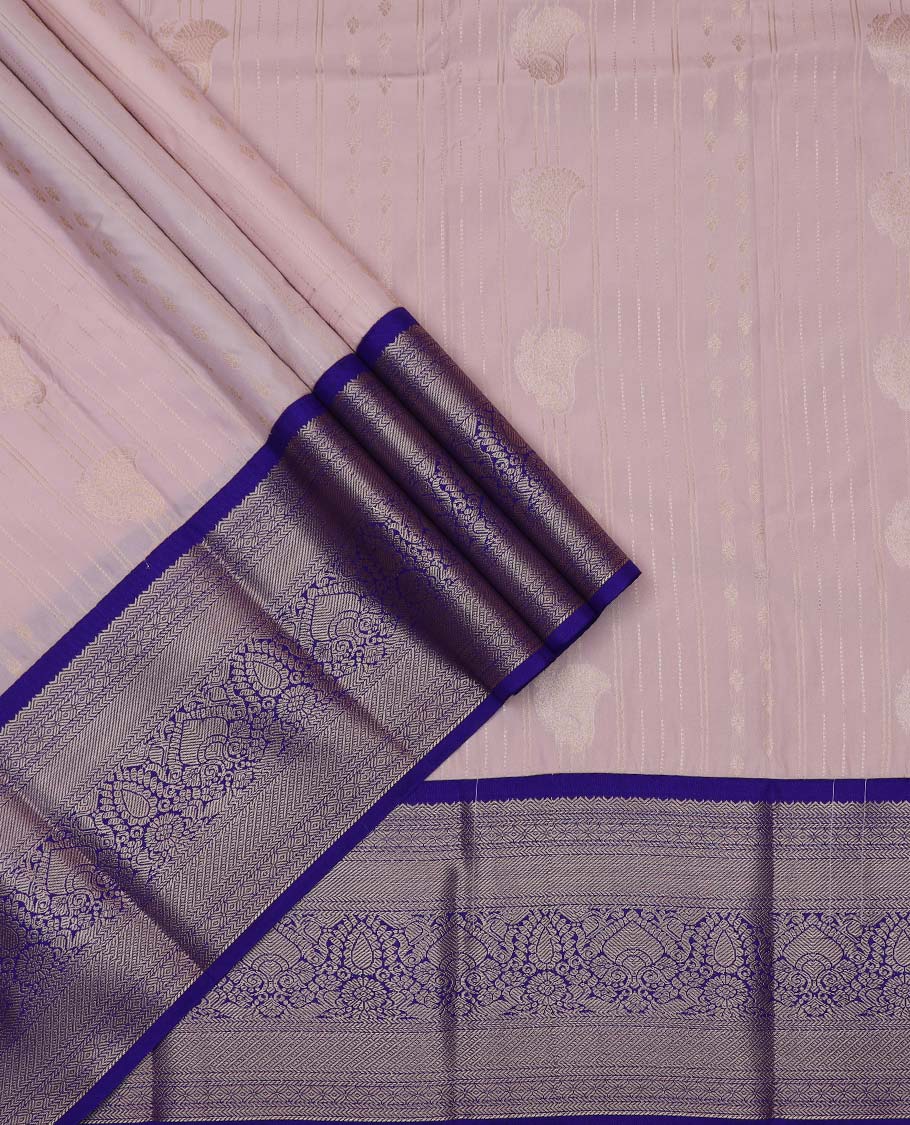 Pastel pink art silk pavadai material, zari design with contrast traditional zari border skirt, and contrast blouse